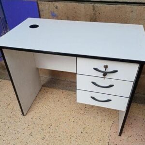 Office desk fitted with three drawers fitted with locks
